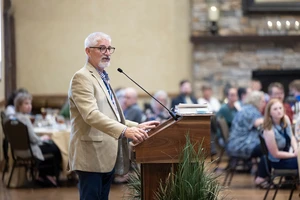 Dr. Brad Dolloff speaks to attendees